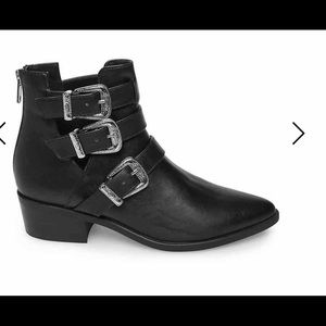 Faux leather upper. Back zipper closure. Almond toe, 2” stacked heel